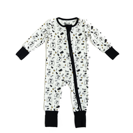 Children's onesie with black and white pattern on a white background