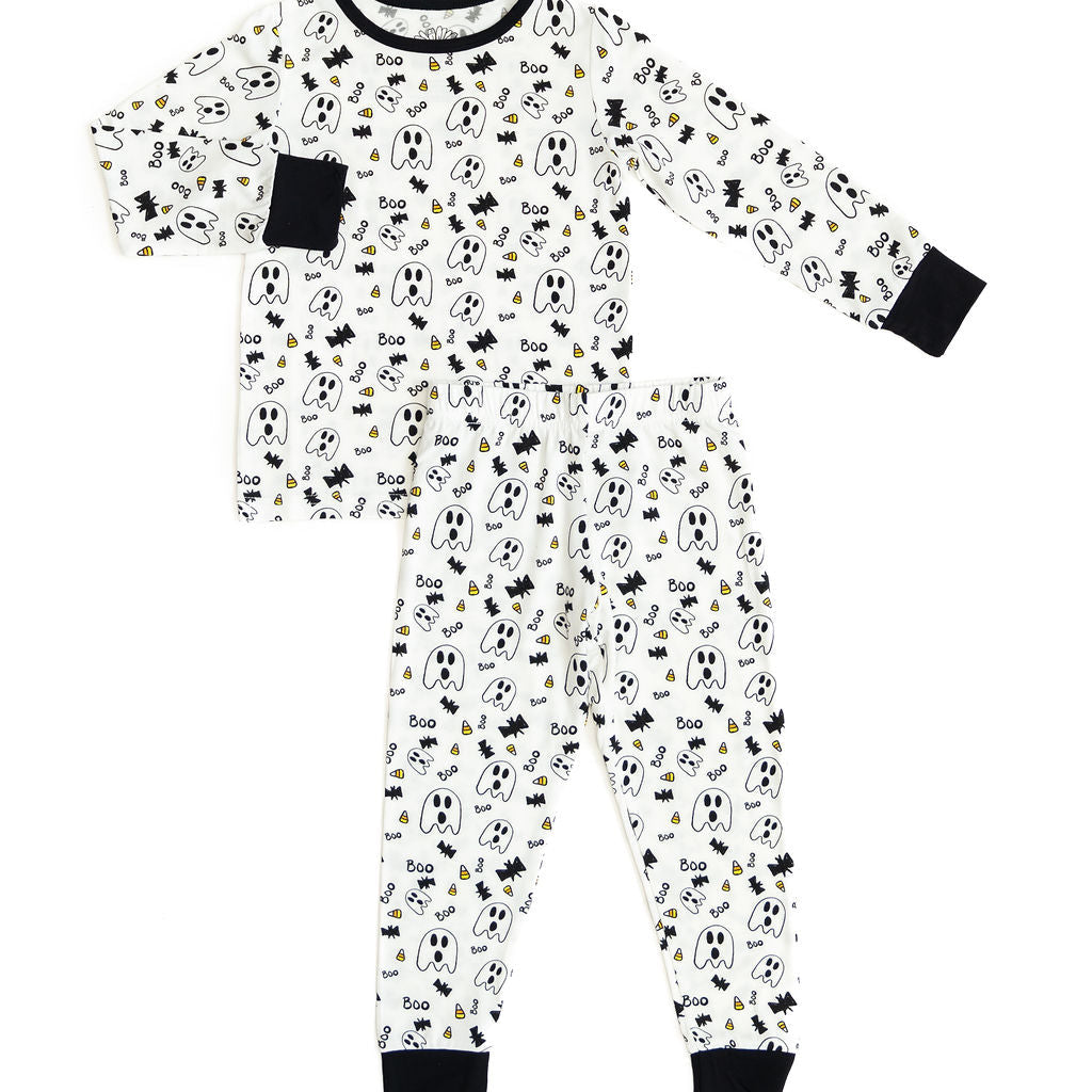 Children's pajama set with Halloween-themed pattern on a white background